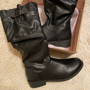Tall black boots